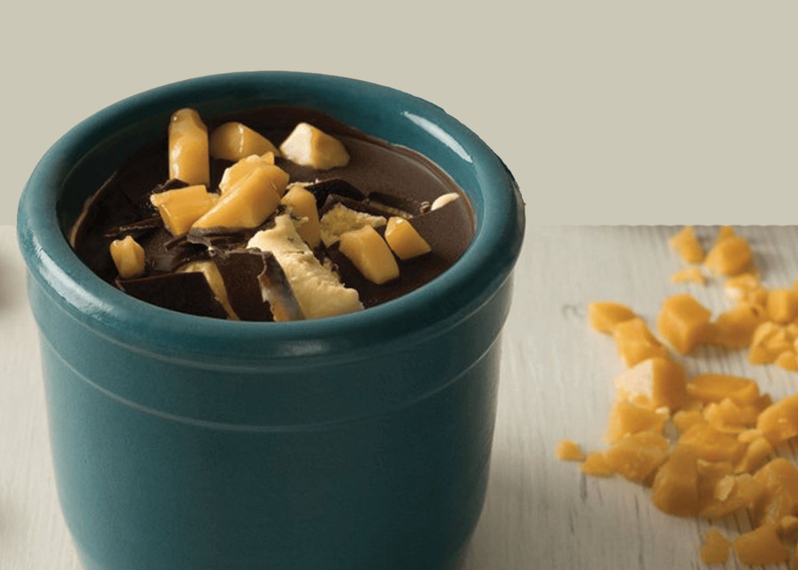 Chocolate caramel pot in a blue pot, individual portion dessert. cakes and desserts range